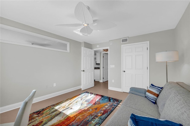 living room with ceiling fan