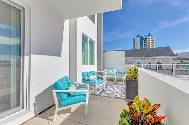 balcony with an outdoor hangout area