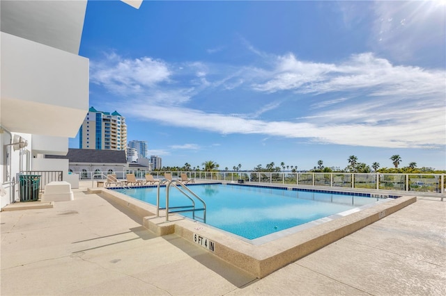 view of pool featuring a patio area