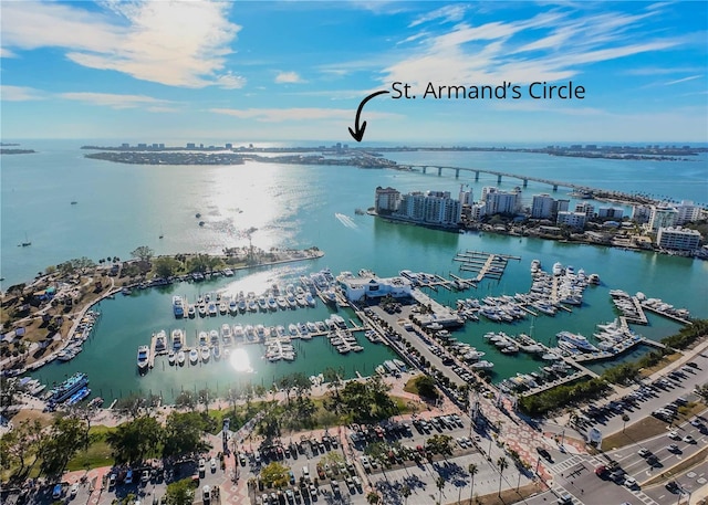 birds eye view of property featuring a water view