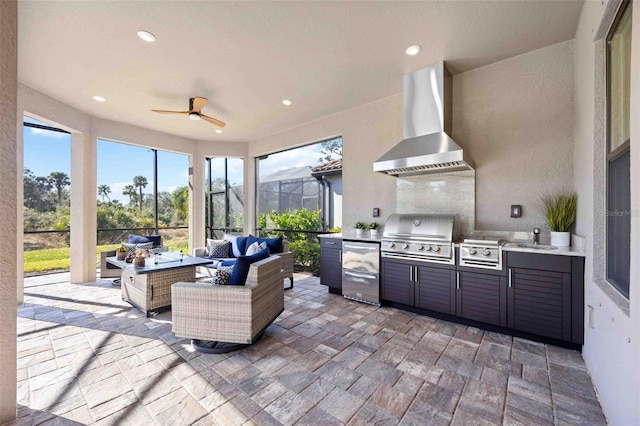 view of patio / terrace featuring sink, grilling area, an outdoor living space with a fire pit, and exterior kitchen