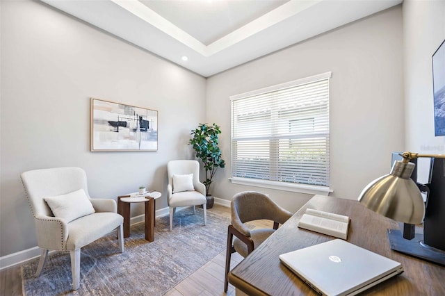 home office with hardwood / wood-style floors