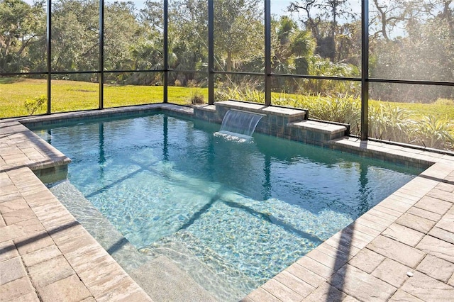 view of pool featuring pool water feature and a lanai