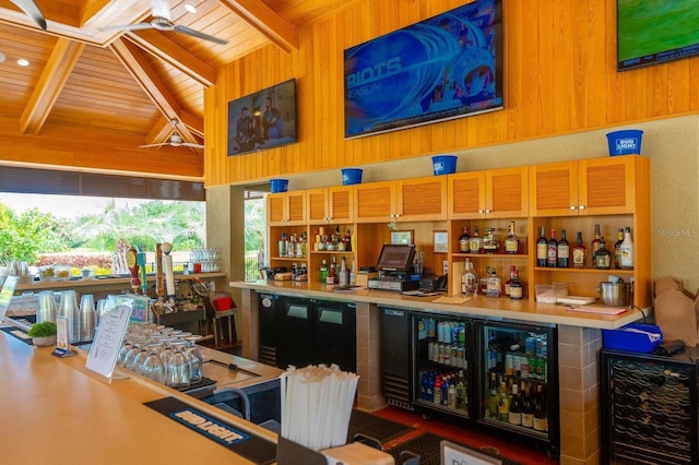 bar with wood ceiling, wooden walls, and lofted ceiling with beams