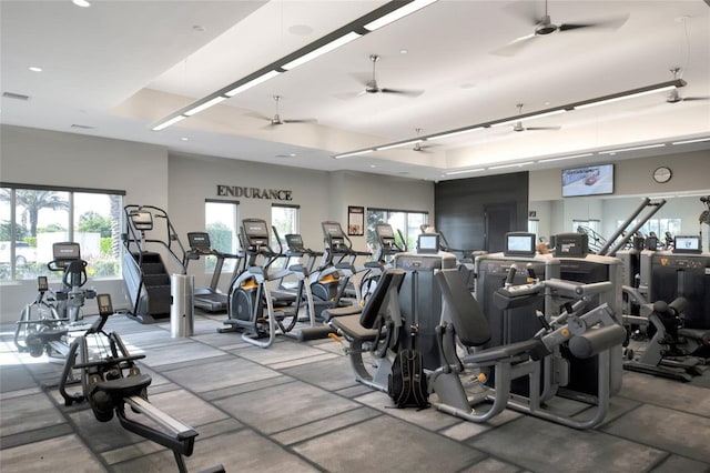 exercise room with ceiling fan