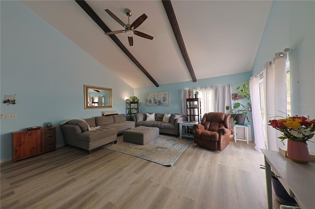 living room with high vaulted ceiling, beam ceiling, light hardwood / wood-style floors, and ceiling fan