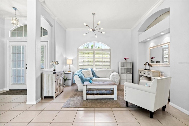 living area featuring a chandelier, crown molding, and light tile patterned floors