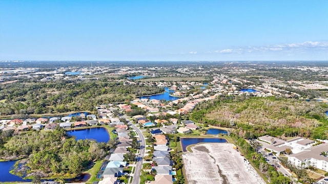 aerial view with a water view and a residential view