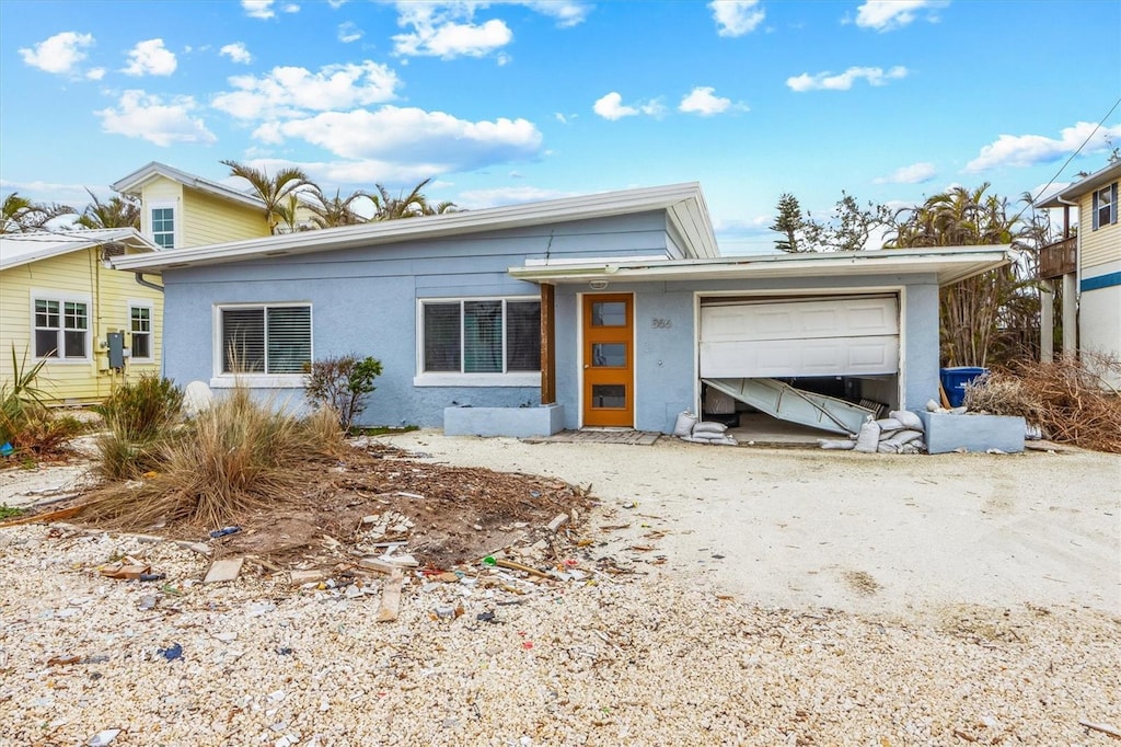 front facade with a garage