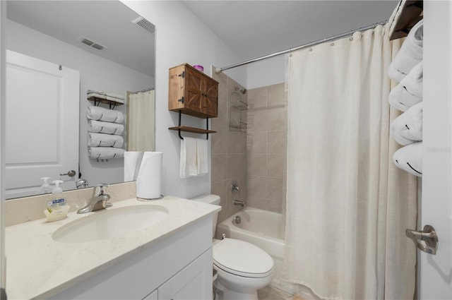 full bathroom featuring vanity, toilet, and shower / bath combo with shower curtain