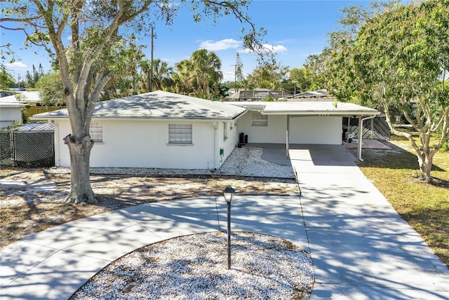 view of front of house with a carport