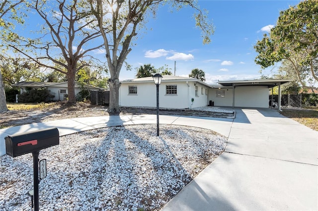 view of front of property with a carport