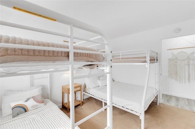 bedroom featuring wood-type flooring