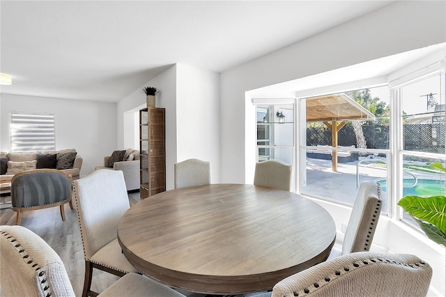 dining area featuring wood-type flooring