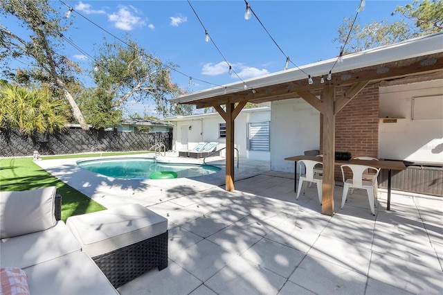 view of swimming pool with an outdoor hangout area and a patio