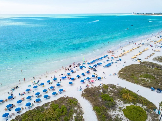 drone / aerial view with a view of the beach and a water view