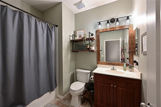 full bathroom featuring tile patterned flooring, vanity, shower / tub combo with curtain, and toilet