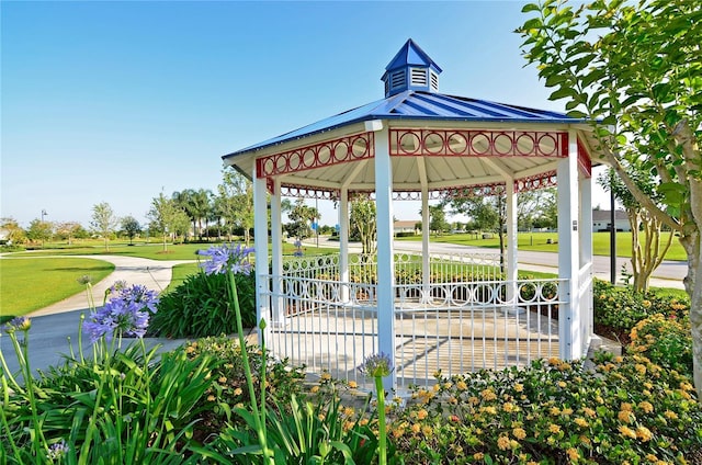 surrounding community featuring a yard and a gazebo