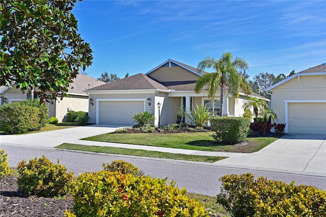 single story home with a garage