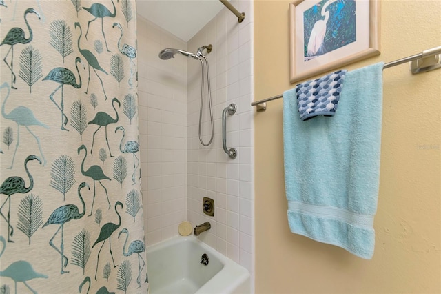 bathroom with shower / bathtub combination with curtain