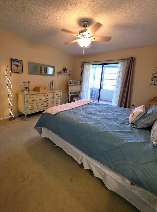 535 Spring Lakes Blvd, Bradenton, FL 34210 - carpeted bedroom with a textured ceiling, ceiling fan, and access to outside