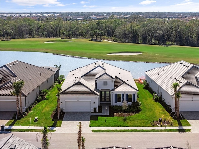 birds eye view of property featuring a water view