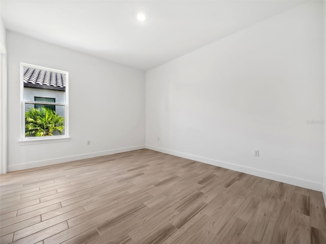 unfurnished room featuring light wood-type flooring