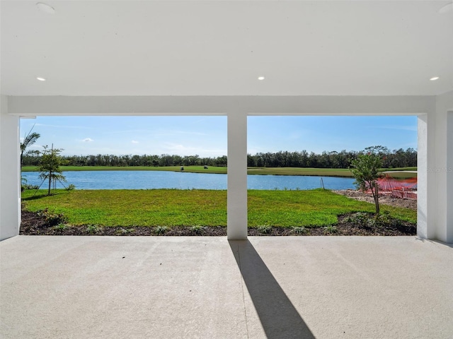 view of patio featuring a water view