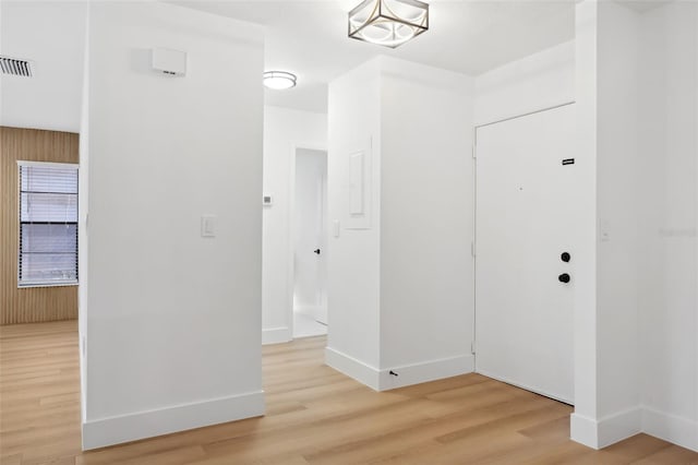 hallway featuring wood-type flooring