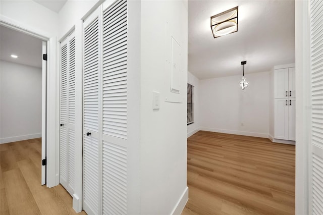 hall featuring light wood-type flooring