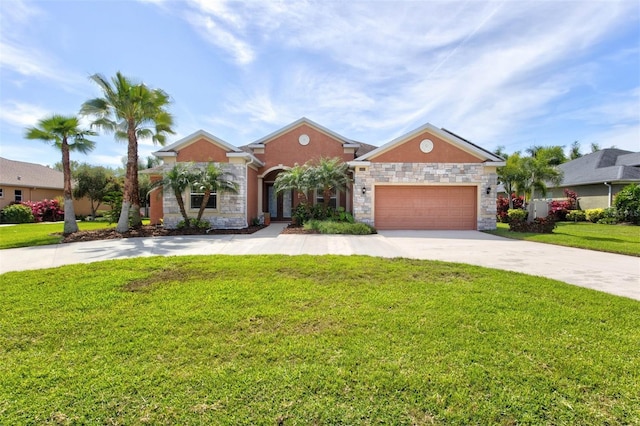 view of front of house with a garage and a front yard