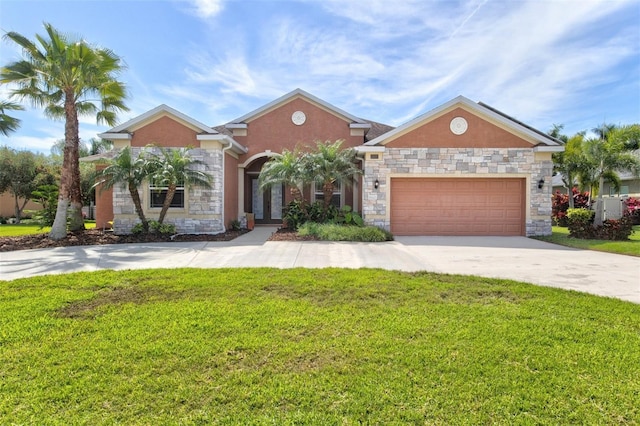 view of front facade with a garage and a front lawn