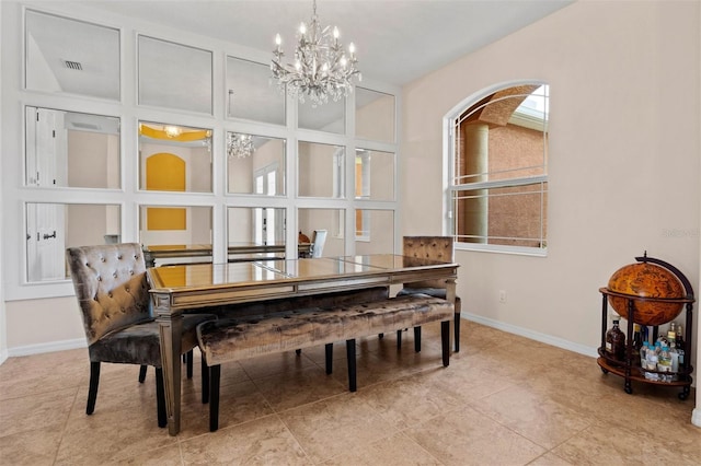 dining area featuring a chandelier