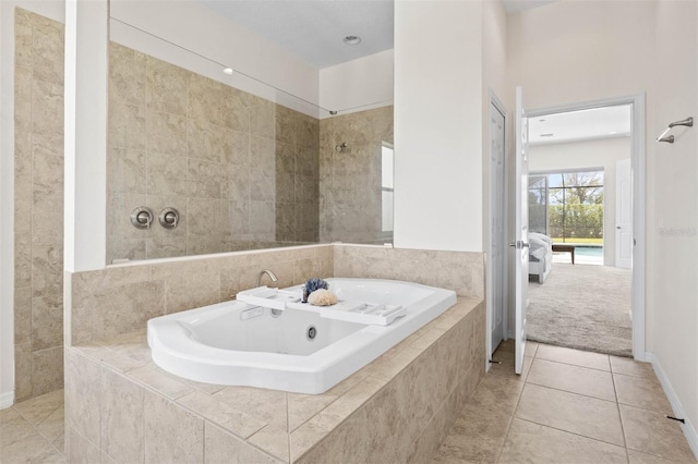 bathroom featuring tile patterned flooring and separate shower and tub