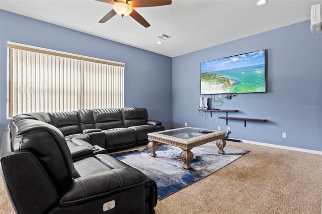 carpeted living room featuring ceiling fan