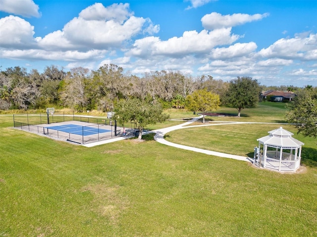 exterior space featuring a gazebo and tennis court