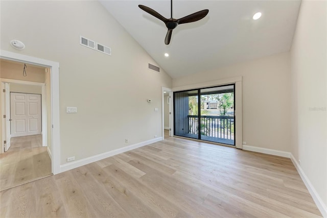 spare room featuring ceiling fan, high vaulted ceiling, and light hardwood / wood-style floors