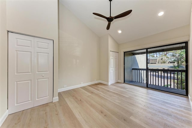 unfurnished bedroom with lofted ceiling, access to outside, ceiling fan, and light wood-type flooring