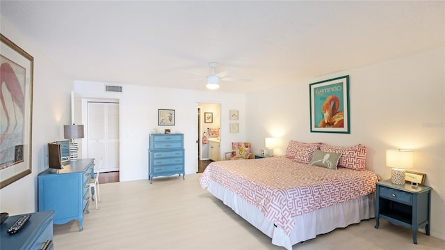 bedroom featuring hardwood / wood-style flooring and ceiling fan