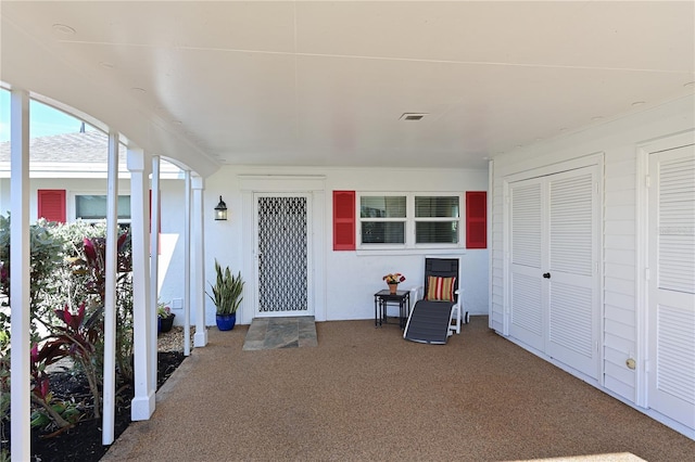 doorway to property with visible vents