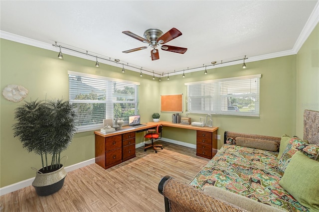 office space with ornamental molding, ceiling fan, a textured ceiling, and light wood finished floors