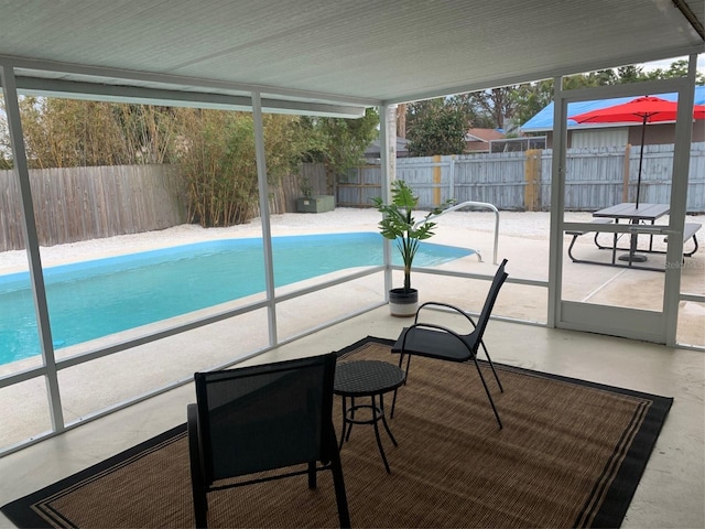 view of swimming pool with a patio