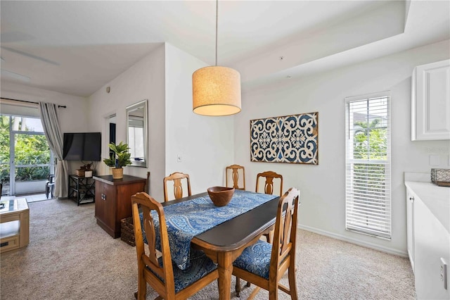 view of carpeted dining area