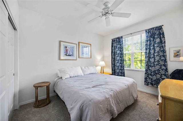 bedroom with ceiling fan, a closet, and light carpet