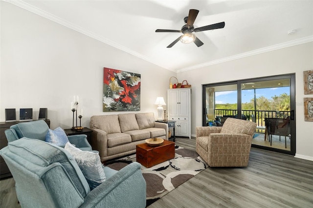 living room featuring lofted ceiling, hardwood / wood-style floors, crown molding, and ceiling fan