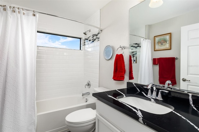 full bathroom with shower / tub combo, vanity, and toilet