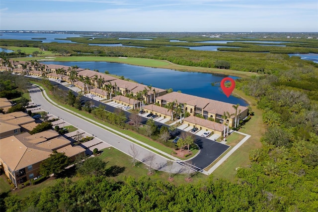 birds eye view of property featuring a water view