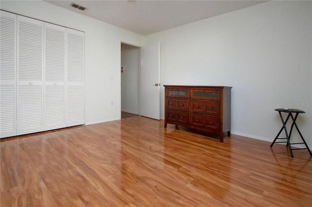 unfurnished bedroom with light hardwood / wood-style flooring