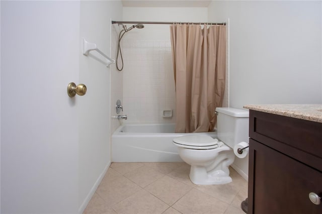 full bathroom featuring tile patterned flooring, vanity, toilet, and shower / bath combo with shower curtain