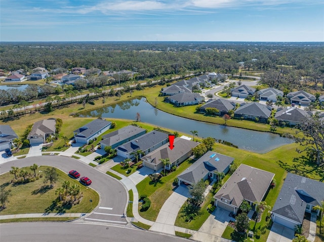 drone / aerial view with a water view